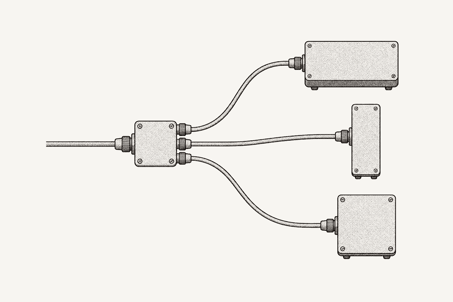 A small junction box seen from above with one cable in and three cables fanning out to three different bench instruments.
